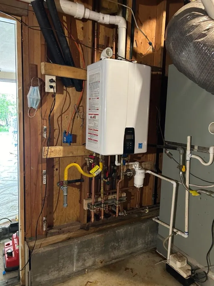 Slide of The Tankless Guys Plumbing and Rooter