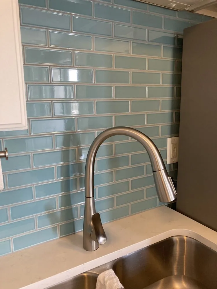 Slide of The Tile Guy