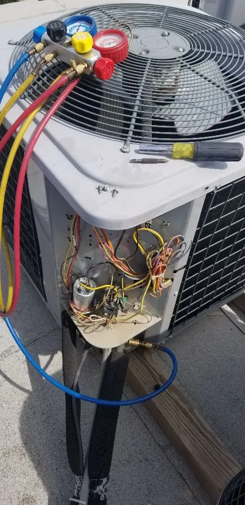 Slide of The Works Air Conditioning and Handyman