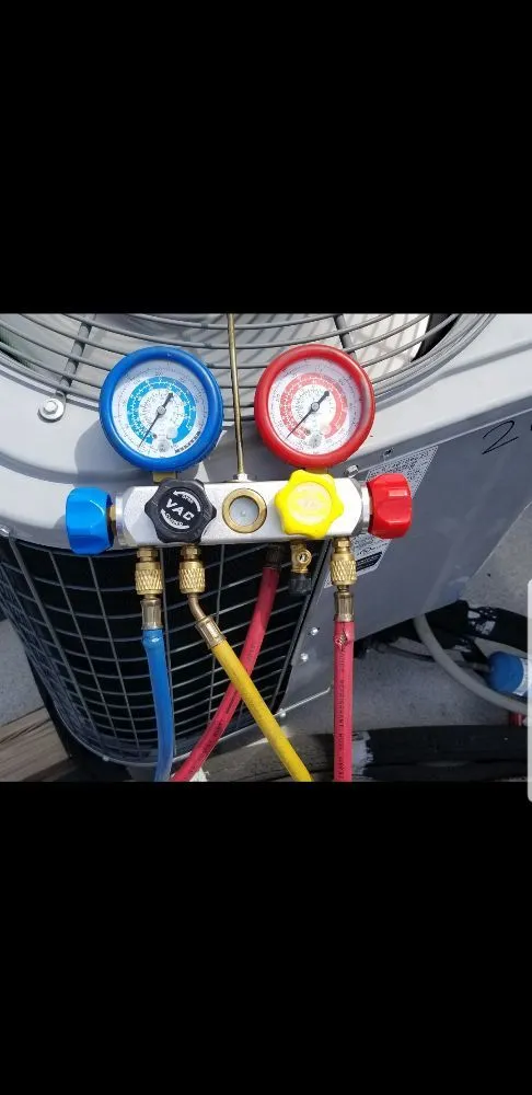 Slide of The Works Air Conditioning and Handyman