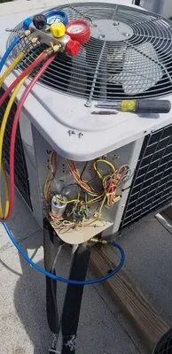 The Works Air Conditioning and Handyman Logo