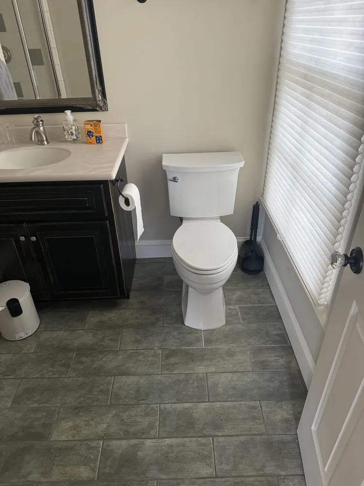 Slide of Three Sons Plumbing