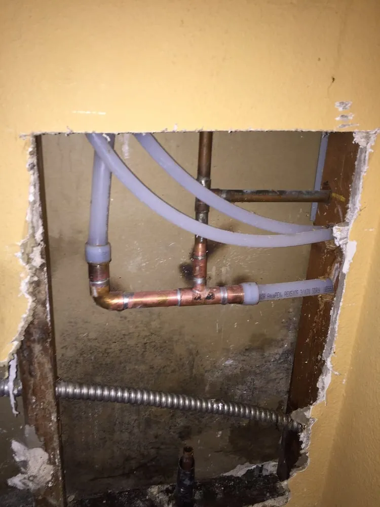 Slide of Tim's Plumbing & Rooter