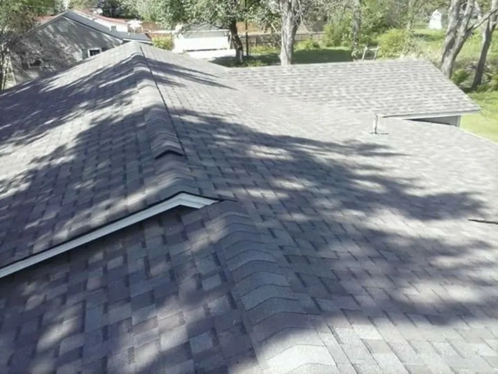 Slide of Tim's Roofing & Remodeling