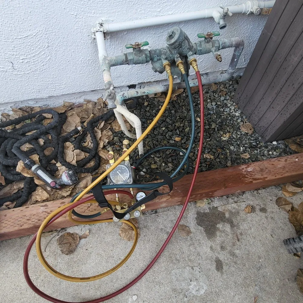 Slide of Titan Backflow Testing and Repair