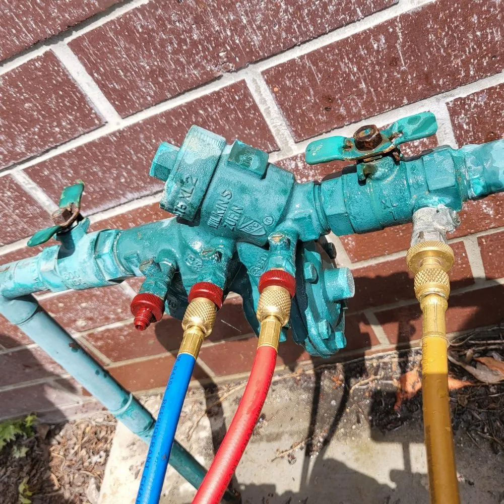 Slide of Titan Backflow Testing and Repair