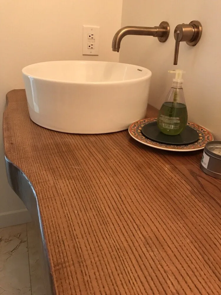 Slide of Titan Plumbing and Remodeling