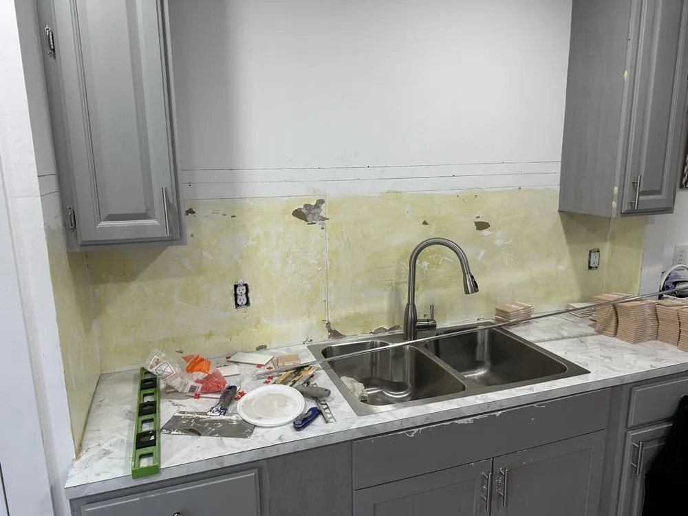 Slide of Tito The Handyman