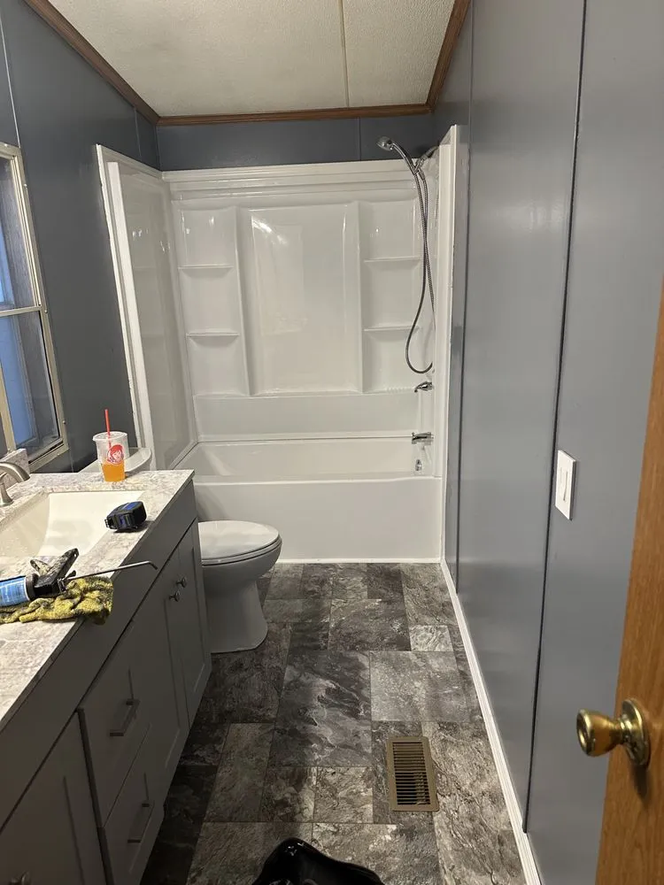 Slide of Tito The Handyman