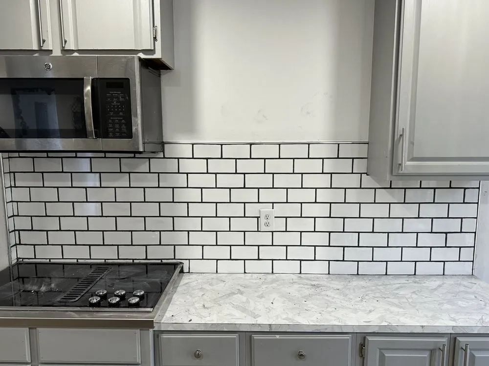 Slide of Tito The Handyman