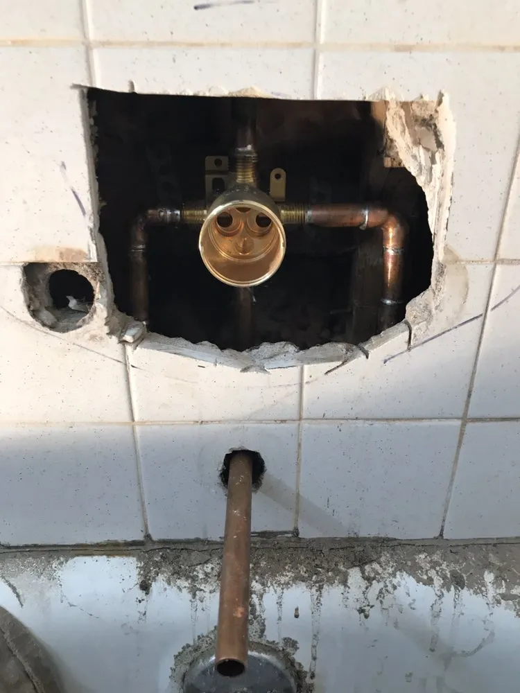 Slide of TJP Plumbing