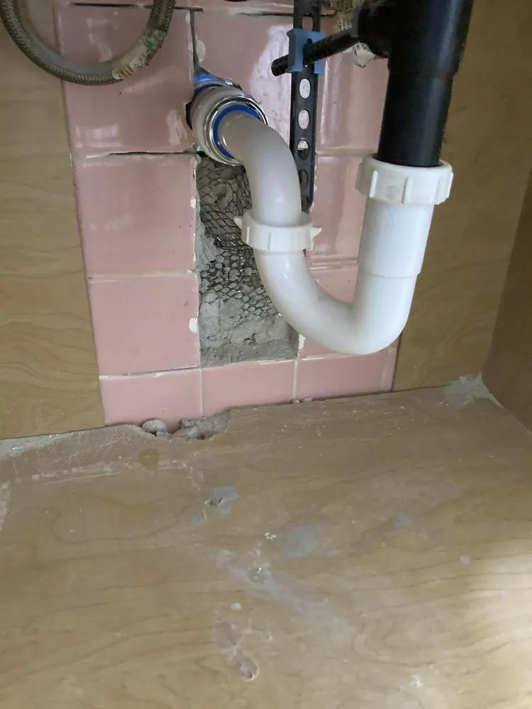 Slide of TJ’s Plumbing & Heating