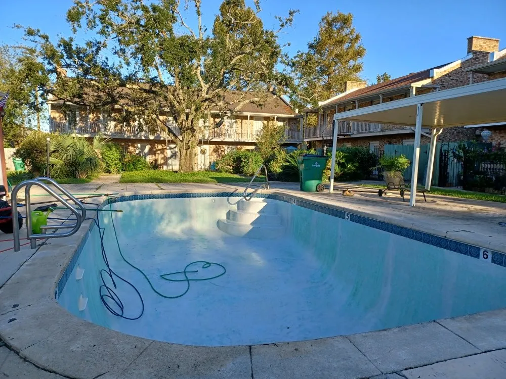 Slide of TK Pool Services