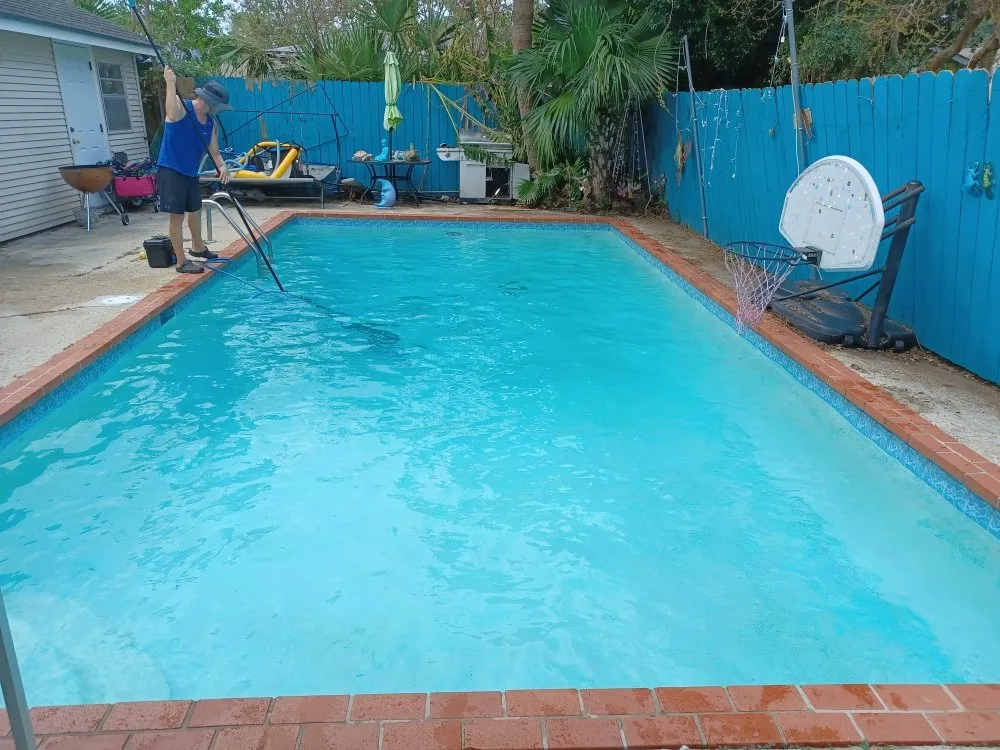 Slide of TK Pool Services