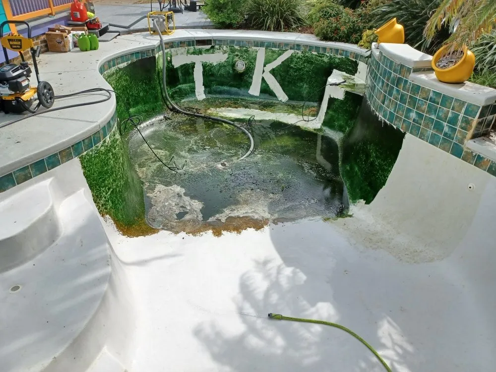 Slide of TK Pool Services