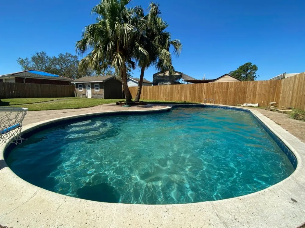 Slide of TK Pool Services