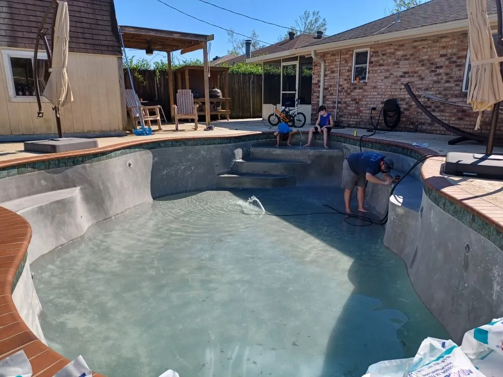 Slide of TK Pool Services