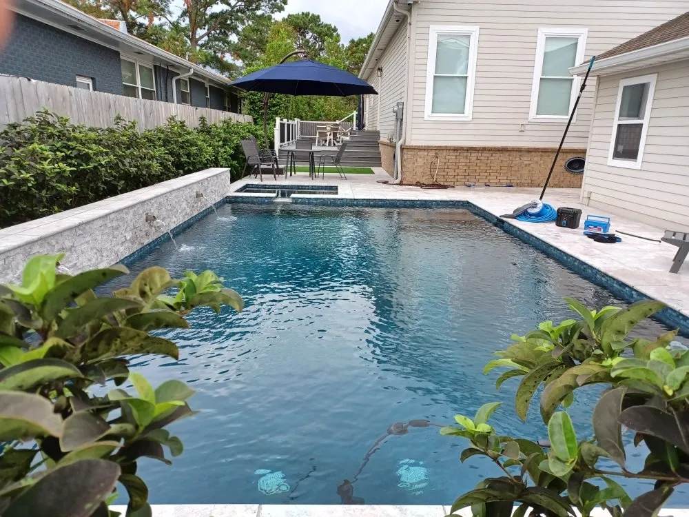 Slide of TK Pool Services
