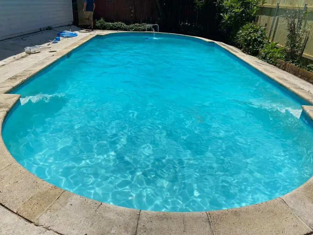 Slide of TK Pool Services