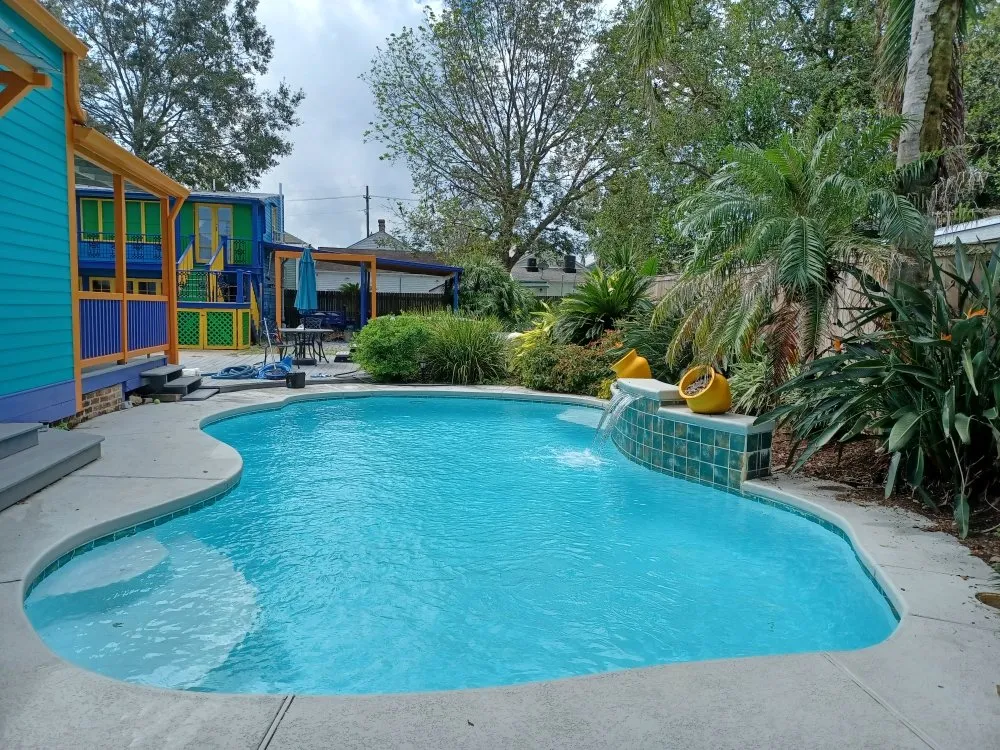 Slide of TK Pool Services