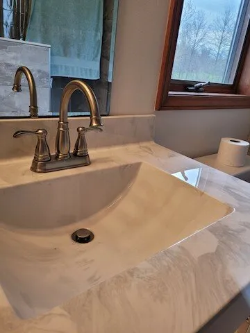 Slide of TL Henderson Plumbing