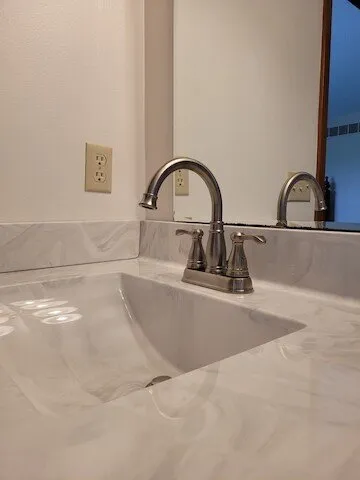 Slide of TL Henderson Plumbing