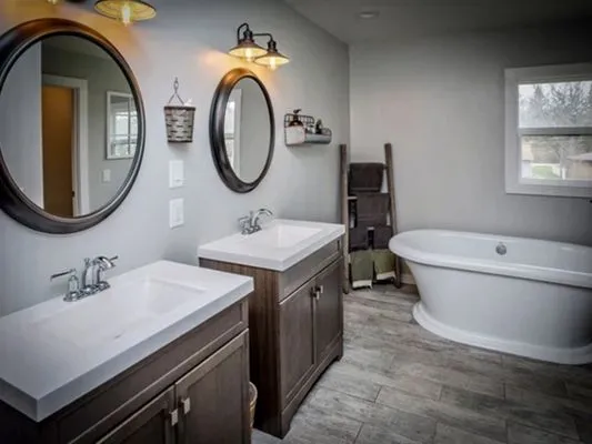 TL Henderson Plumbing Logo