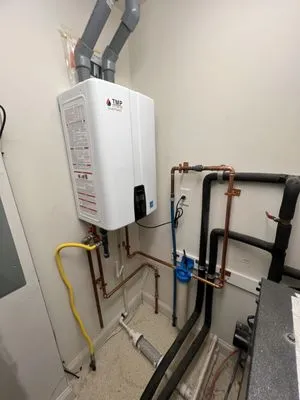 TMP Plumbing & Heating Logo