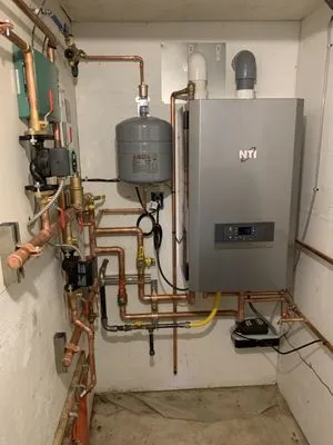 TNT Plumbing and Heating Logo