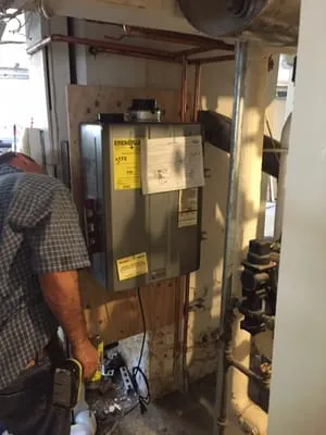 Tom Miskich Plumber Logo