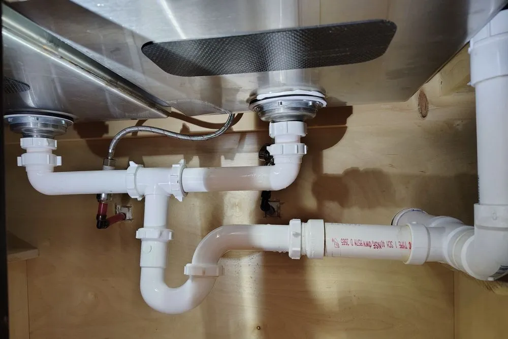 Slide of Tommy Dunson plumbing