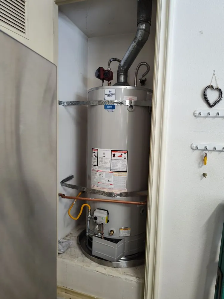 Slide of Tommy's Tankless Water Heaters & Whole House Filtration