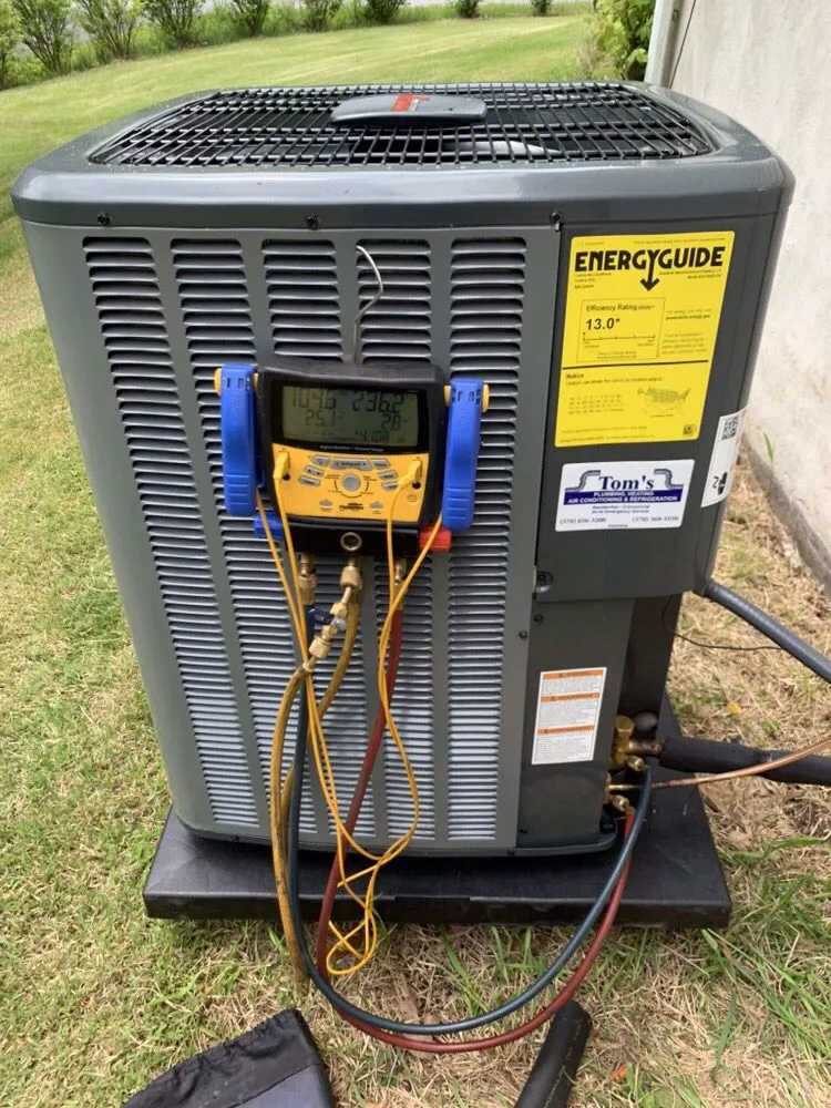 Slide of Tom's Plumbing & Heating