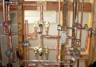 Slide of Tom's Plumbing Service