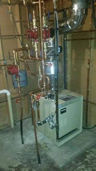 Slide of Tom's Plumbing Solutions