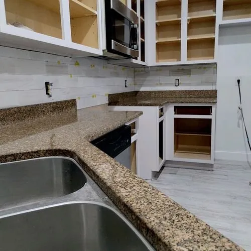 Slide of Tom's Pro Handyman Service