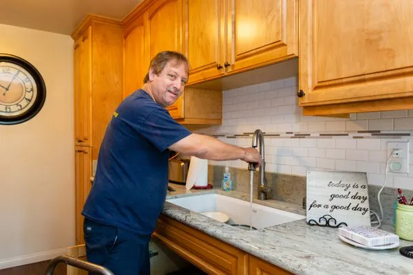 Toms Quality Plumbing Logo