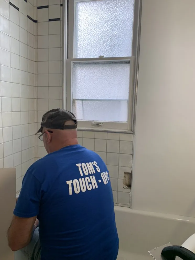 Slide of Tom’s Touch - Ups