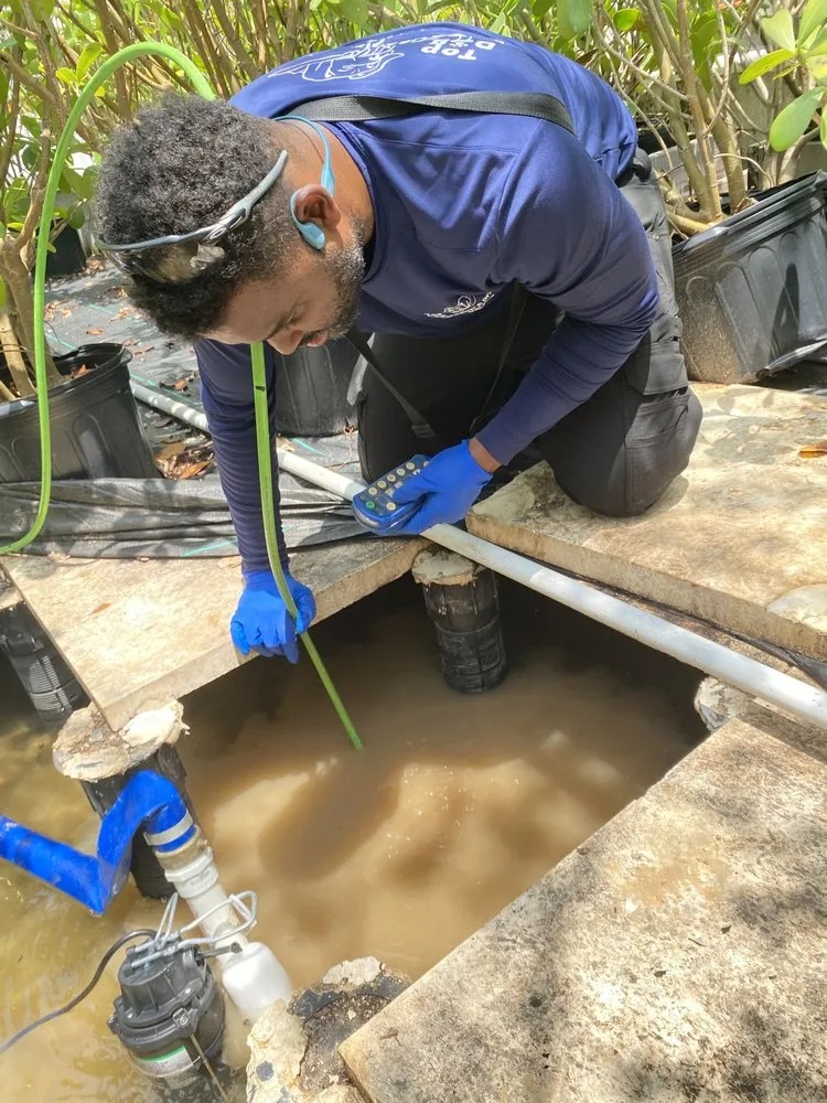 Slide of Top Dog Drain & Sewer Cleaning