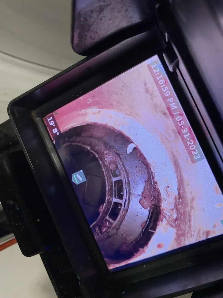 Slide of Top Dog Drain & Sewer Cleaning