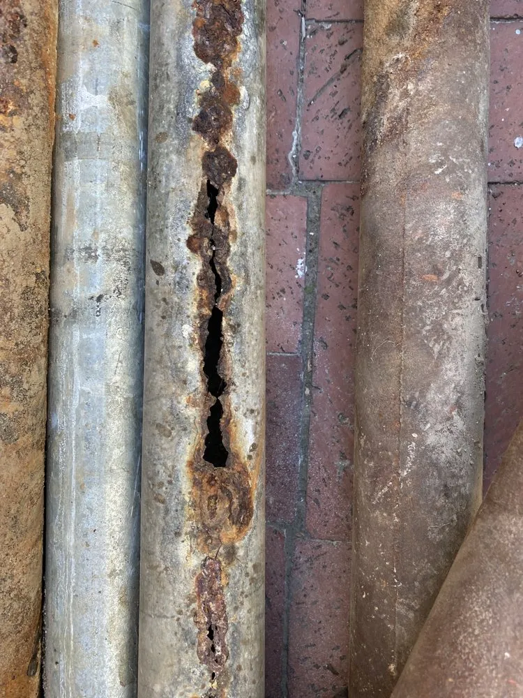 Slide of Top Grade Plumbing & Rooter