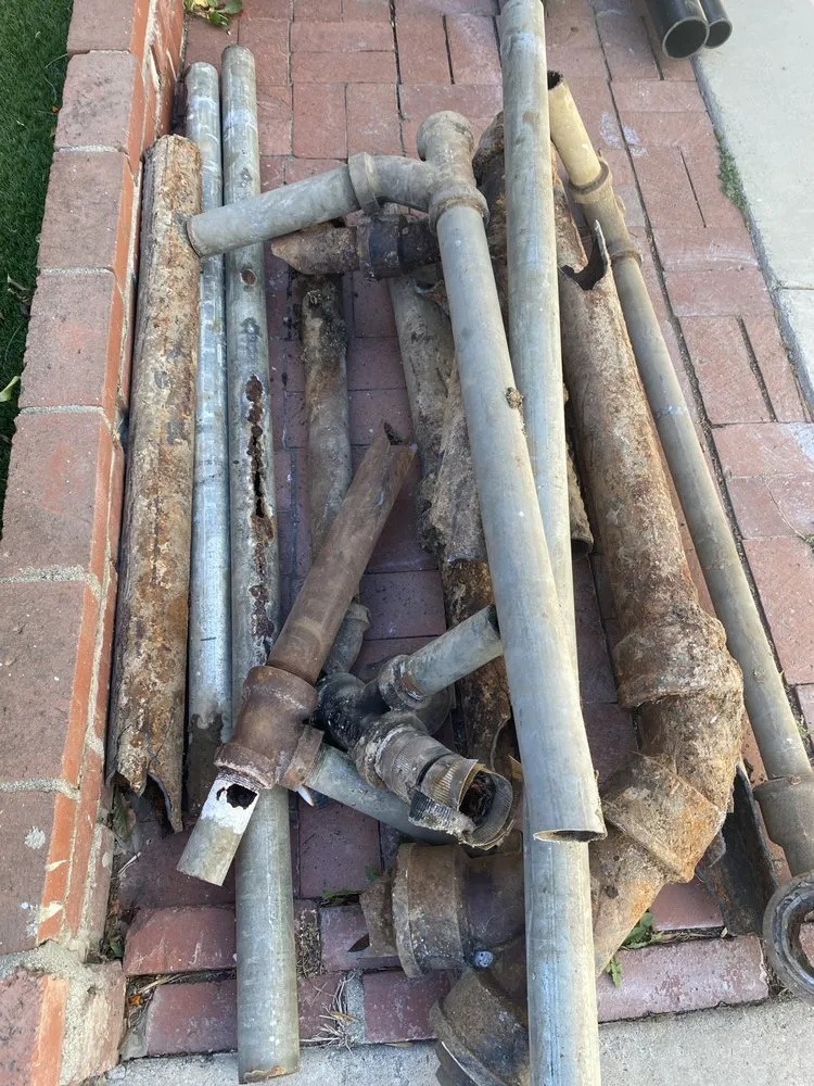 Slide of Top Grade Plumbing & Rooter