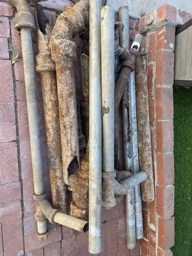 Slide of Top Grade Plumbing & Rooter