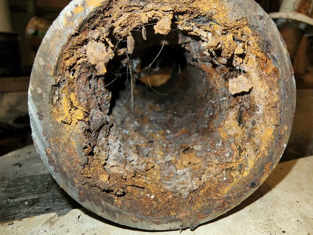 Slide of Top Notch Pipe Lining