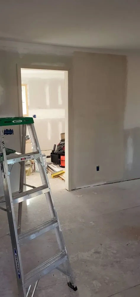 Slide of Top of ladder paint n drywall