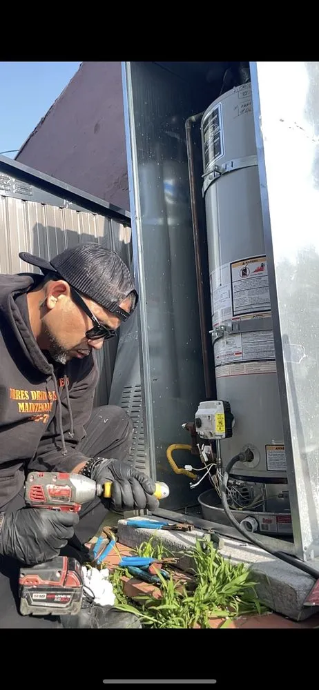 Slide of Torres Drain & Water Heaters