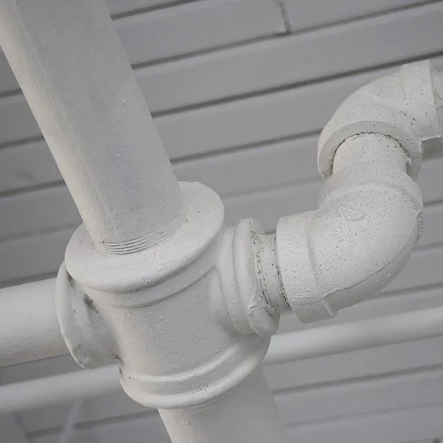 Slide of Tozzie's Drain Cleaning