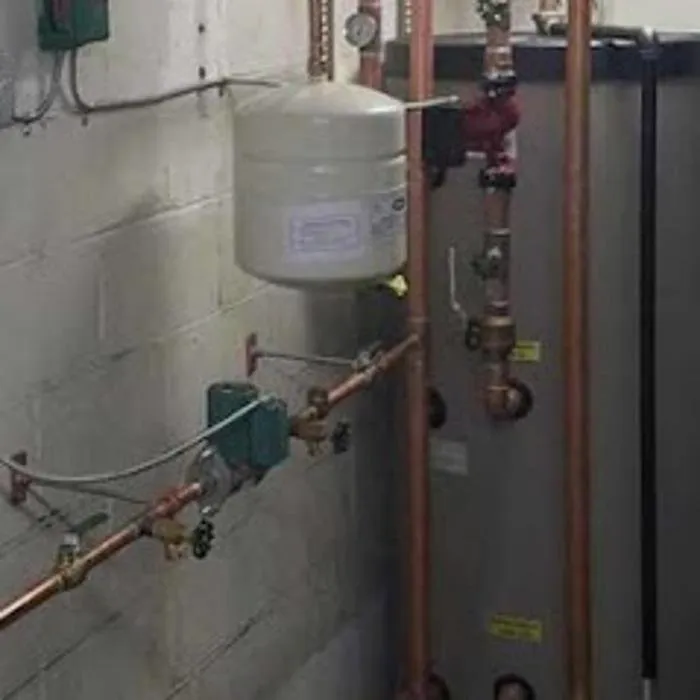 Slide of Trademark Plumbing and Heating