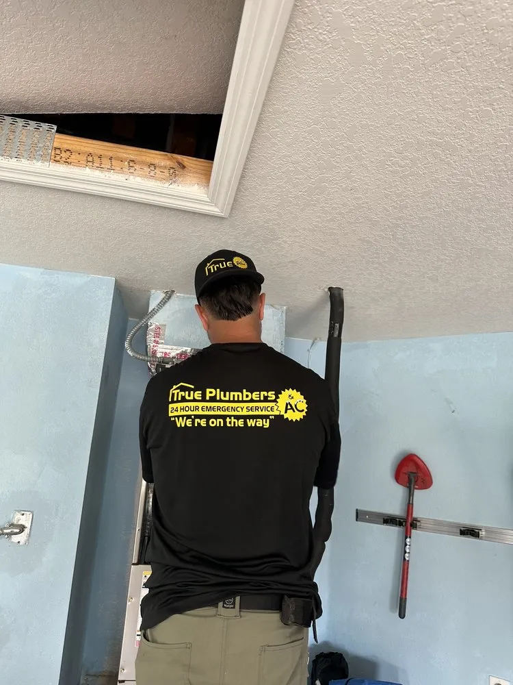 Slide of True Plumbers & AC