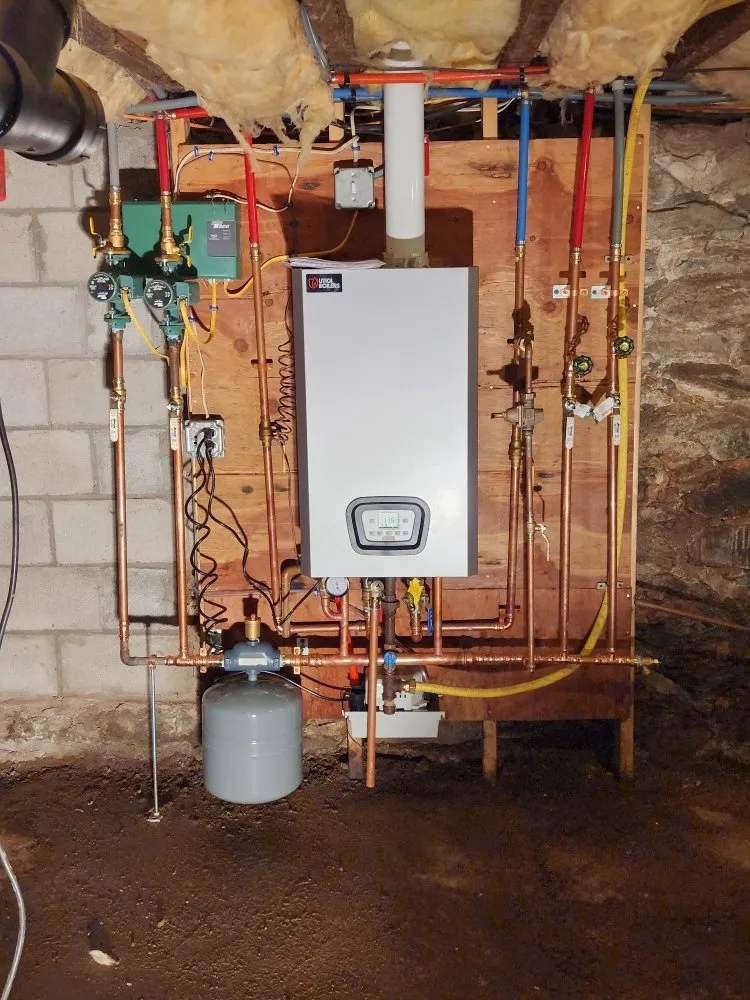 Quality water heater service for homes in Hartford, CT by TT and CA Plumbing and Heating